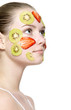 Girl with fruit mask