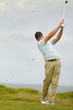 Foto: Golfer in action from the fairway Golfer in action from the fairway