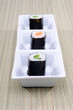 Three Kappa Maki Sushi Rolls On A Serving Plate Three Kappa Maki Sushi Rolls On A Serving Plate