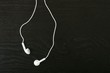 Photo: Music white earphones whith white background Music white earphones whith white background