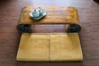 Traditional Japanese straw mattress, table and tea pot.