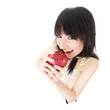 Fun woman with red apple and measure tape on the glass scales