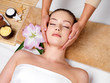 Massage for the skin on face in beauty salon Massage for the skin on face in beauty salon