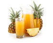 Jug and glass of pineapple juice with fruits isolated