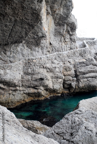 Photo: turquoise sea, surrounded by cliffs turquoise sea, surrounded by cliffs