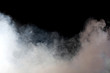 White smoke on black background. Isolated.