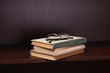 Glasses on stack of books.