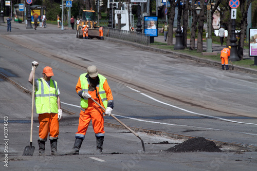 Photo: Road workers with shovels Road workers with shovels