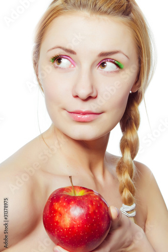 Photo: portrait of young woman with red apple isolated on white portrait of young woman with red apple isolated on white