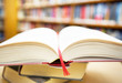 ����: Open book on book stack � falcn #31380108