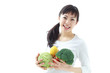 野菜を持った女性