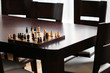 Chess and empty chairs close to table Chess and empty chairs close to table