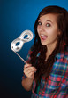 teen holding a silver mask