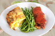Kartoffelgratin mit Bohnen und Hähnchenschnitzel Cordonbleu