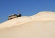 Woman With Off Road Car On Sand Dunes