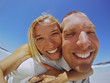 Couple Having Fun On The Beach