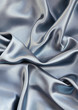 Photo : Smooth elegant blue silk can use as background Smooth elegant blue silk can use as background