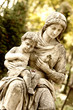 Monument of the woman with the child on a cemetery Monument of the woman with the child on a cemetery