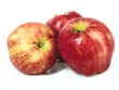 Three fresh red apples on white background