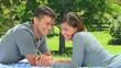 Loving young couple talking outside