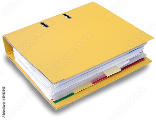 Photo: Close up of yellow ring binder isolated Close up of yellow ring binder isolated