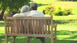 Video: Mature couple sitting talking outdoors Mature couple sitting talking outdoors