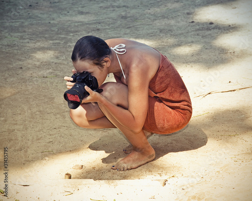 Photo: woman and camera woman and camera