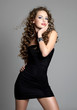 Young glamour sexy girl in black dress