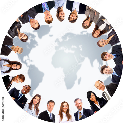 Photo: Group of people around a world map Group of people around a world map