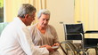 Doctor giving pills and instructions to his patient