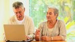 Video: Retired couple using a laptop Retired couple using a laptop