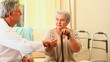 Doctor taking a patients pulse