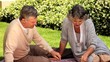 Mature couple picnicking in the garden