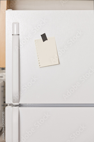 Photo: Note on refrigerator door Note on refrigerator door