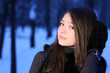girl the teenager in fur mittens.