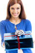 Young happy smiling woman with gift, isolated on white
