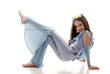Pretty Hippy Little Girl Sitting On The Floor