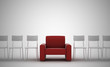 comfortable armchair between ordinary seats