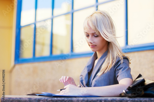 Photo: Young businesswoman working Young businesswoman working