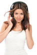 slim woman listening and enjoying music in headphones