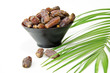 Plate full of Dates Fruit isolated on white Background