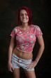 Happy smiling young red haired woman