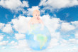 little baby on Earth globe on fluffy clouds in sky collage little baby on Earth globe on fluffy clouds in sky collage