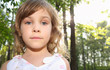 Portrait of little girl with curly blonde hair in white clothes Portrait of little girl with curly blonde hair in white clothes