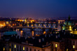 Illuminated Prague briges night panorama, Czech Republic