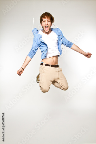 Foto: jumping young man jumping young man