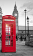 Red phone booth in London with the Big Ben in black and white Red phone booth in London with the Big Ben in black and white