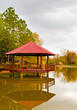 Asian pavilion with reflection on a lake