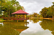 Asian pavilion with reflection on a lake