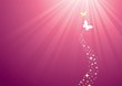 Two butterflies flying into the light